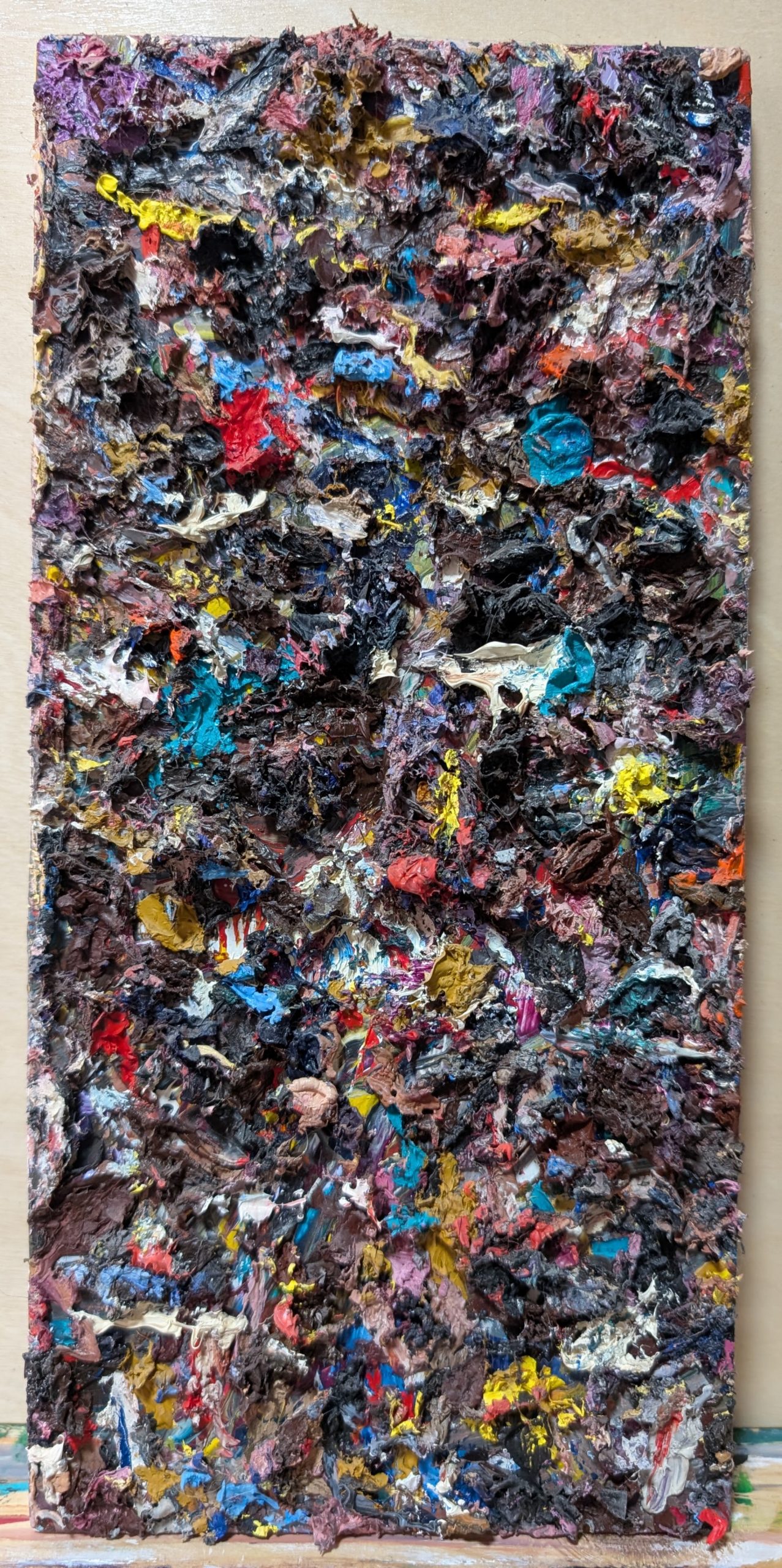 Thick ribbons and artifacts of oil paint on canvas. Abstract.