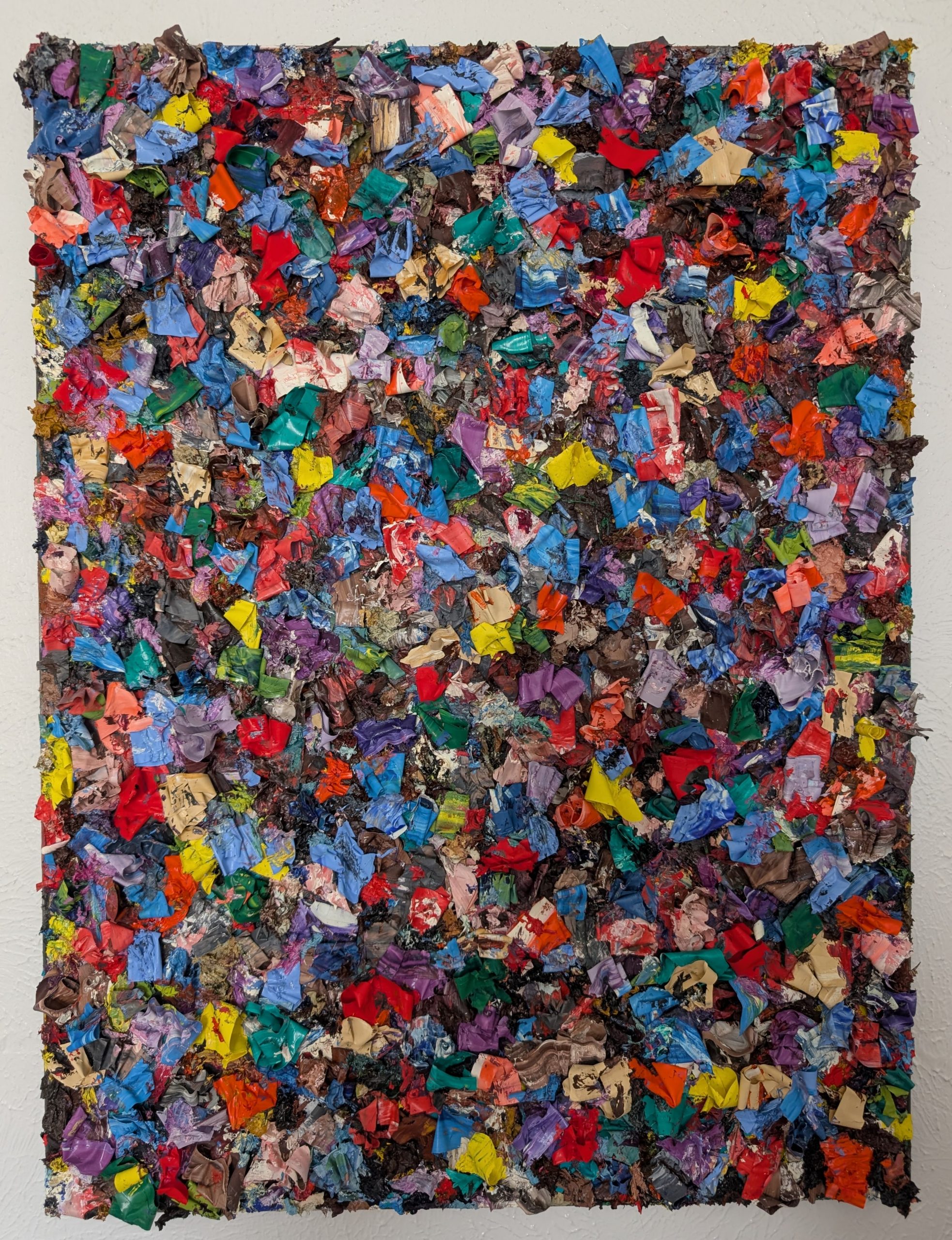 Thick ribbons and artifacts of oil paint on canvas. Abstract.