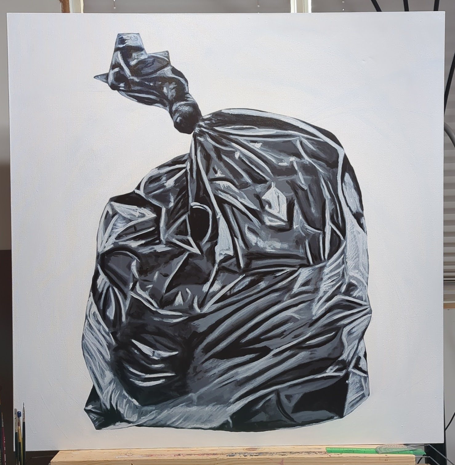 Oil painting of a bag of garbage with a white background.